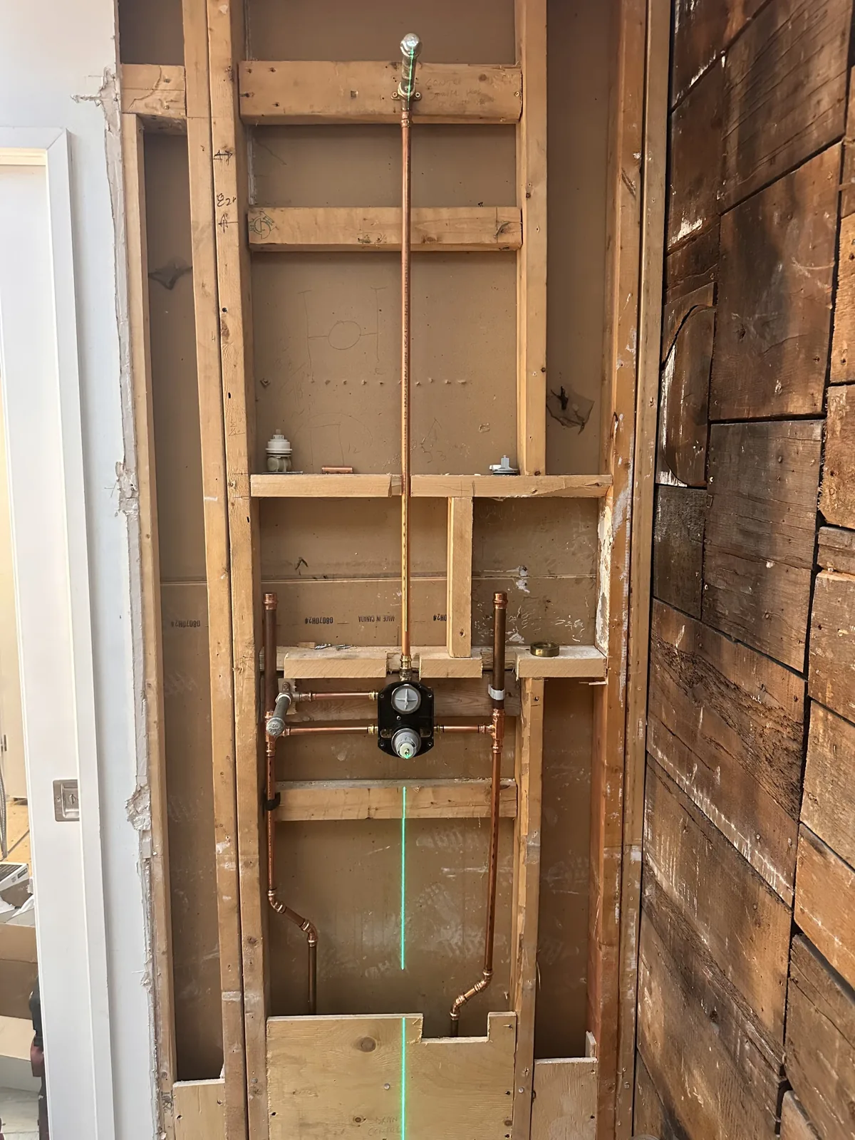 Precise copper plumbing installation during a residential renovation